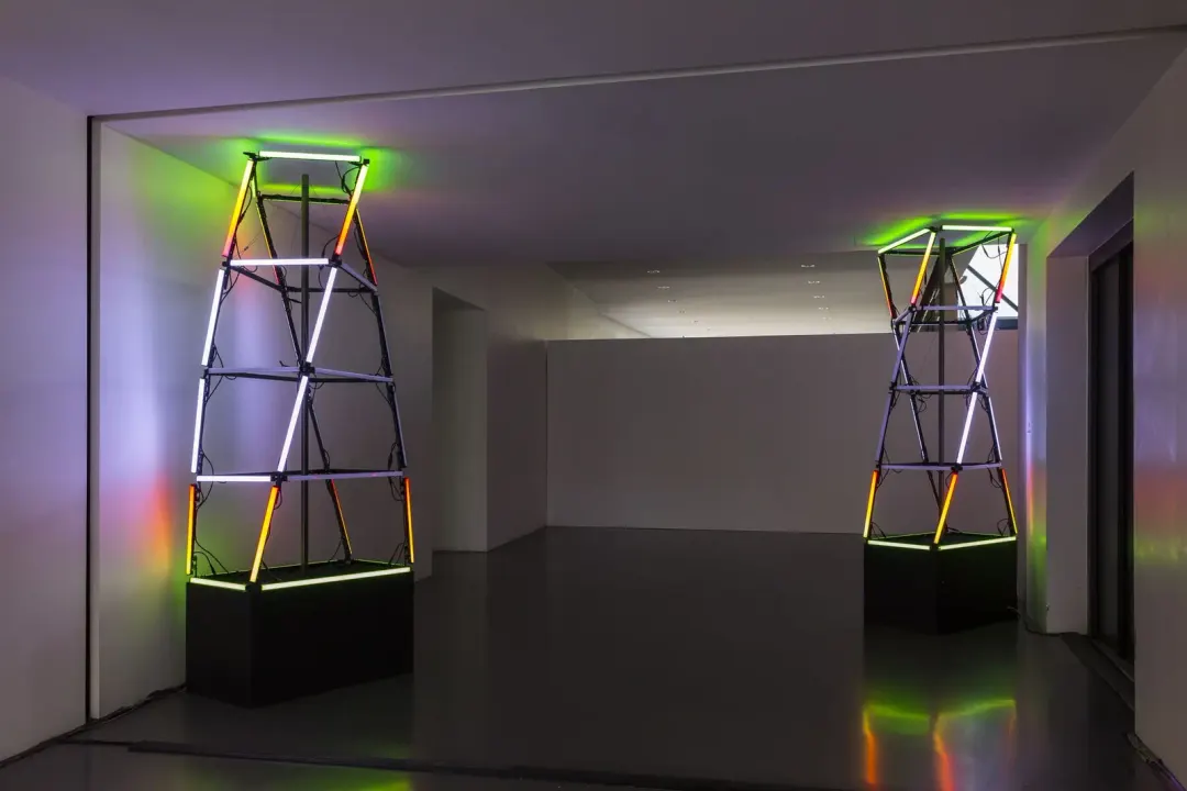The two light totems in a gallery at Mapping Festival
